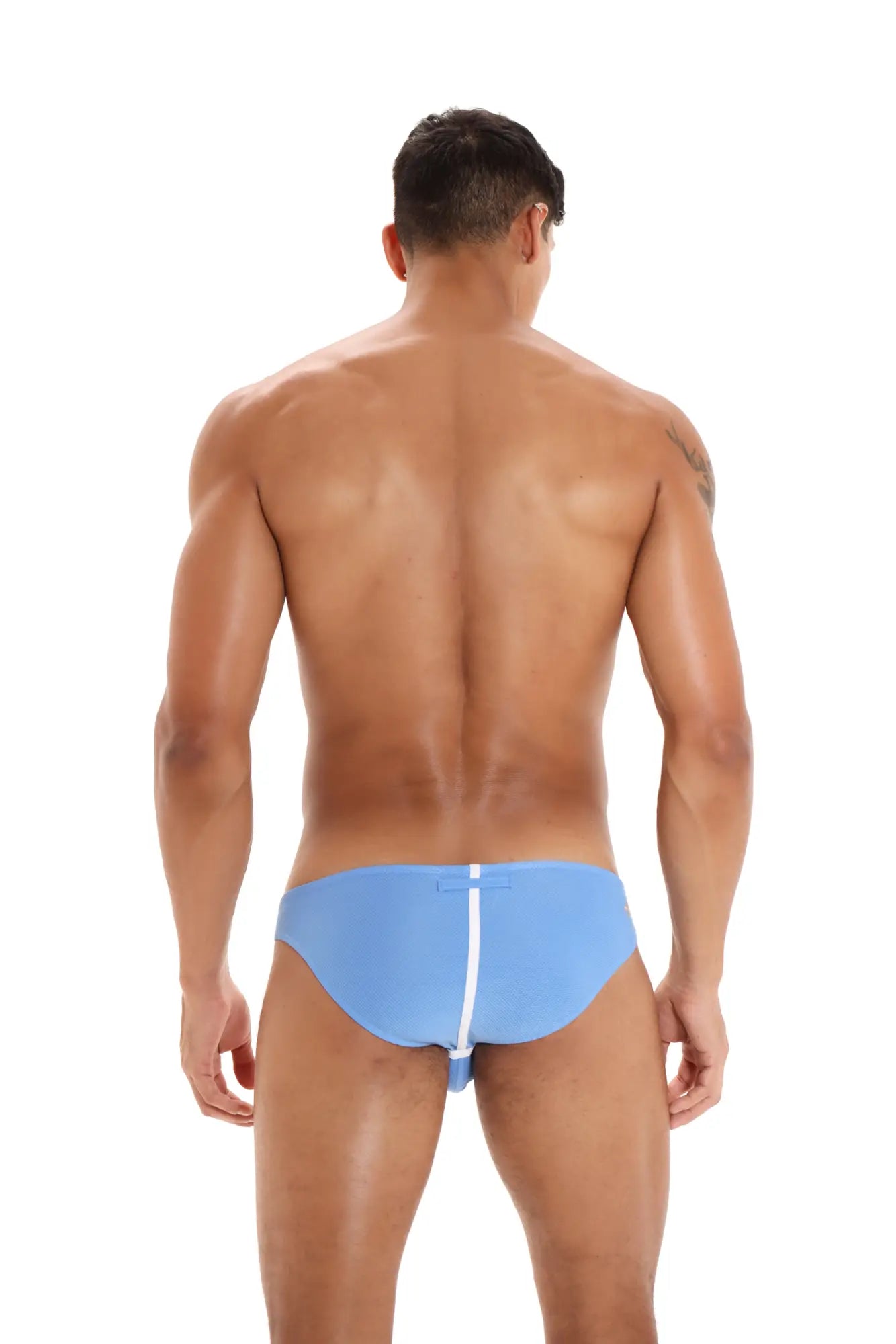Light blue Marcuse Oscar brief underwear showing the back with white zipper detail on swim trunks material