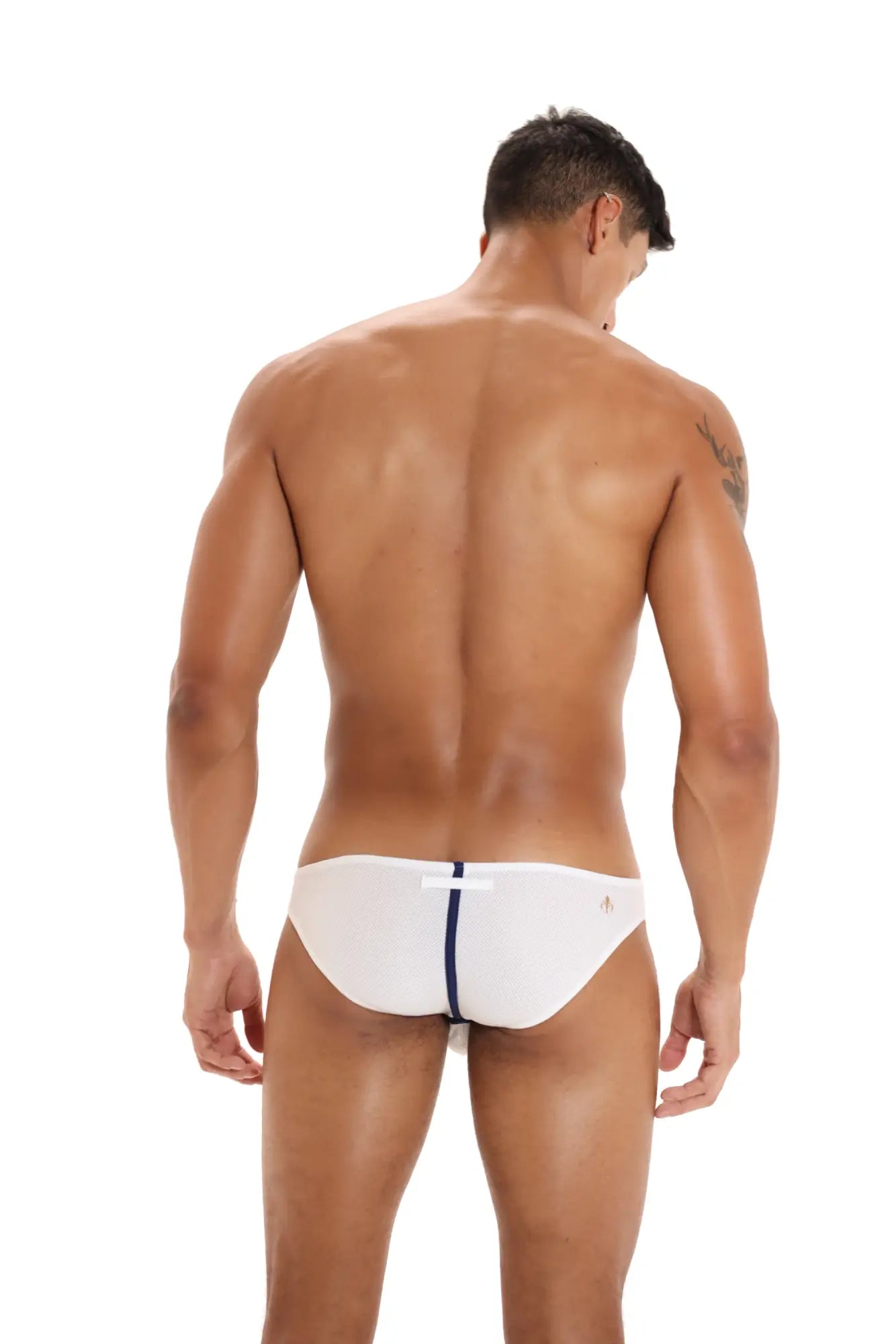 White Marcuse Oscar Brief swim trunks with a navy blue vertical stripe down the center for stylish beachwear