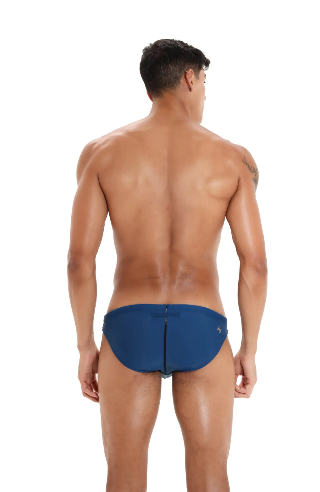 Blue swim trunks from Marcuse Panache bikini swimwear featuring a zipper closure and a small side logo
