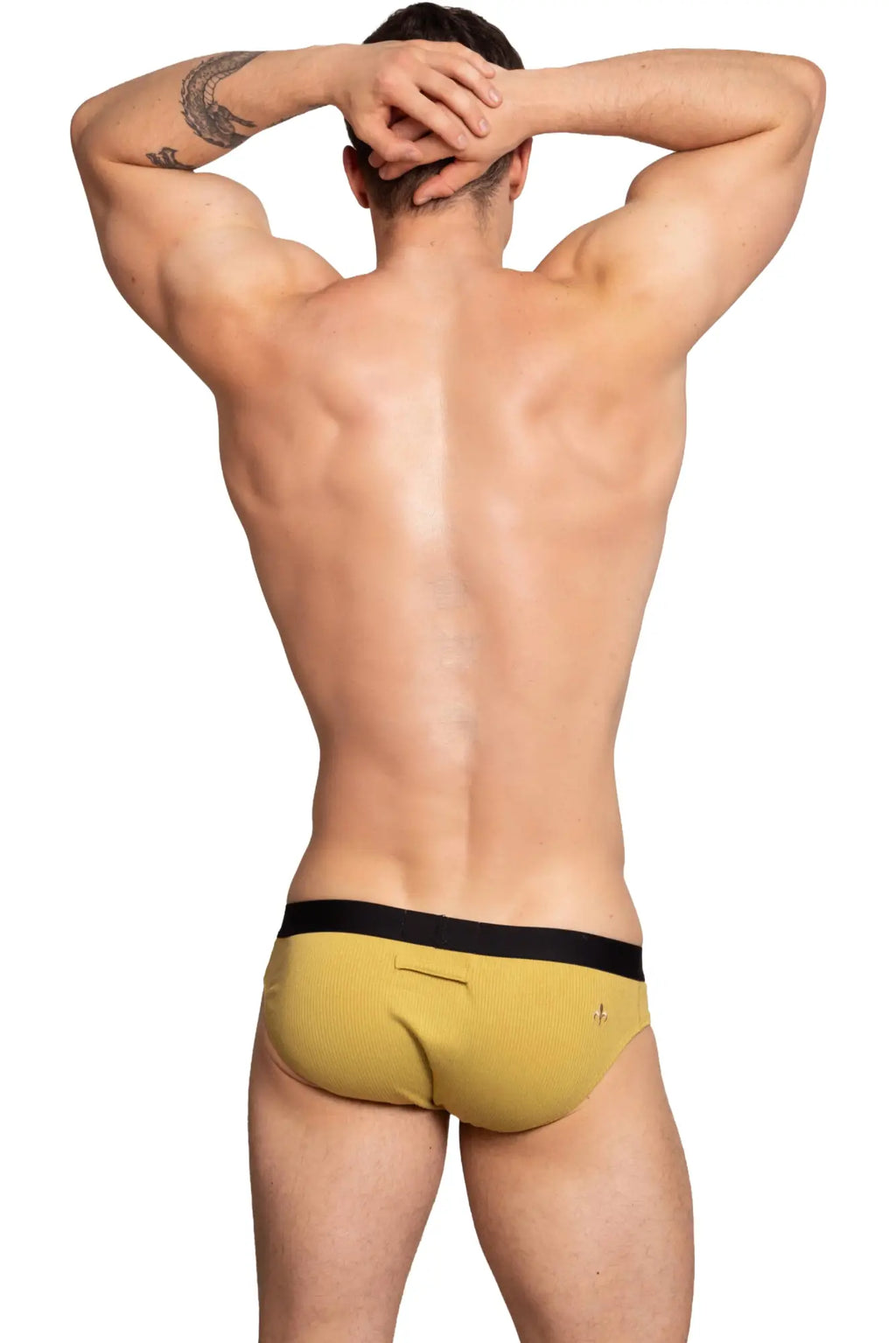 Marcuse Passant brief underwear in yellow ribbed fabric with a black waistband for comfortable daily wear