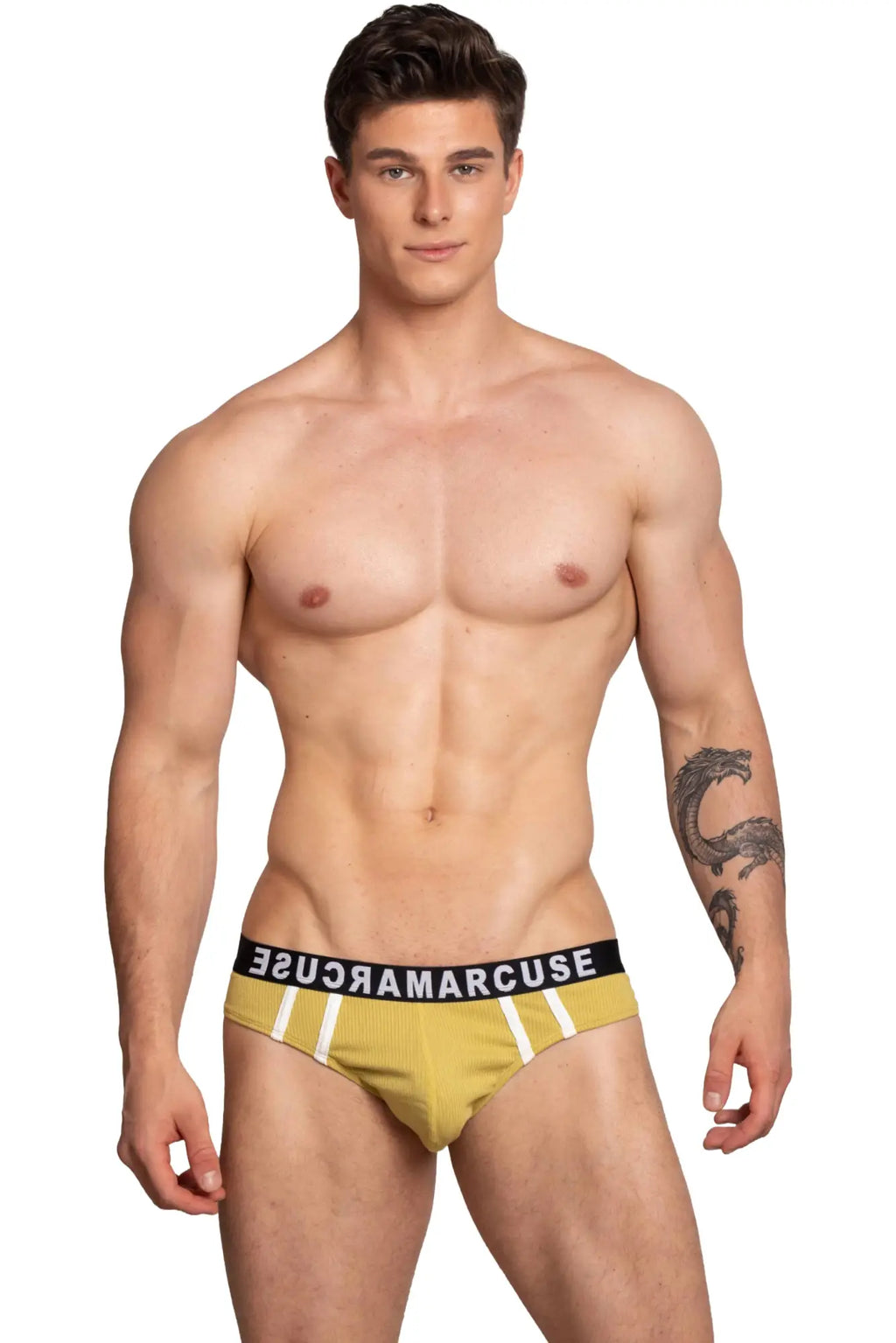 Yellow ribbed marcuse passant brief underwear with white stripes and black waistband featuring brand name susamarcuse