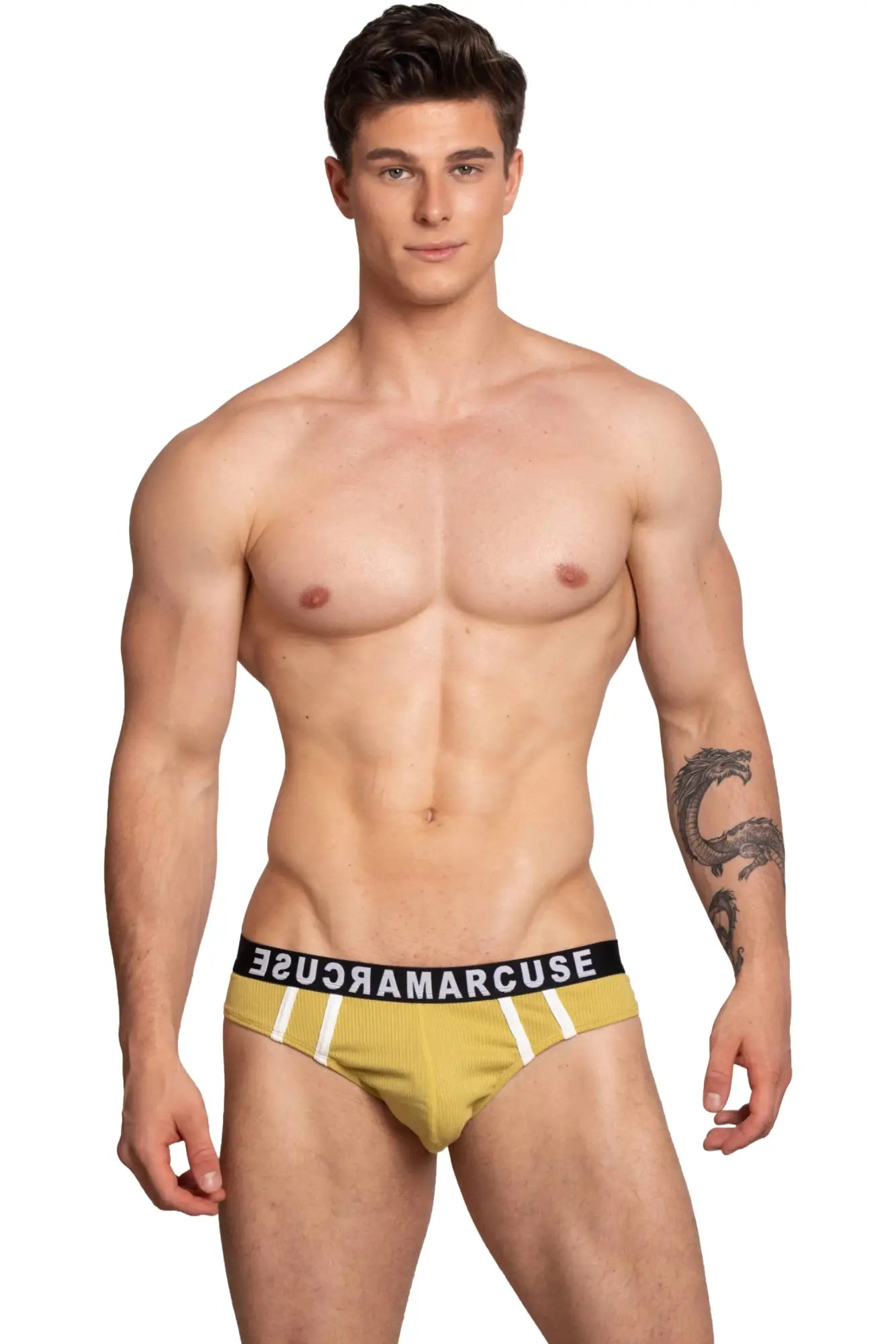 Yellow ribbed marcuse passant brief underwear with white stripes and black waistband featuring brand name susamarcuse