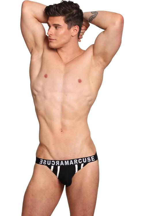 Black briefs with white vertical stripes and a black waistband branded sugar marcuse marcuse passant jock underwear