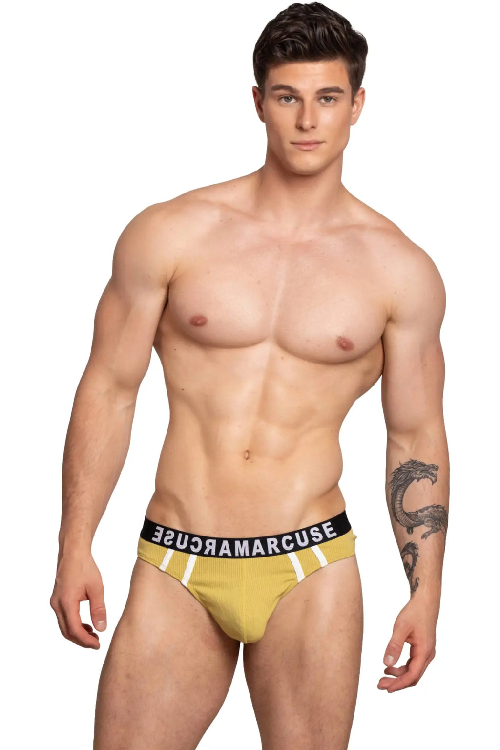 Yellow ribbed briefs with a black waistband featuring white lettering by marcuse passant thong underwear