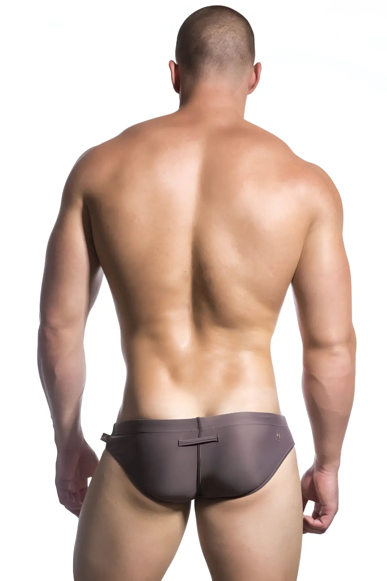Marcuse Patrol bikini swimwear dark gray sleek form-fitting swim trunks with subtle back closure detail shown from back