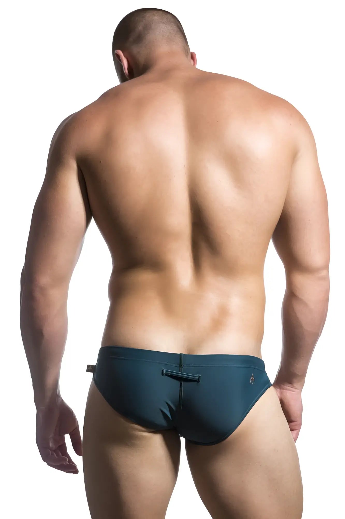 Dark teal marcuse patrol bikini swimwear with sleek form-fitting swim trunks and a small side logo