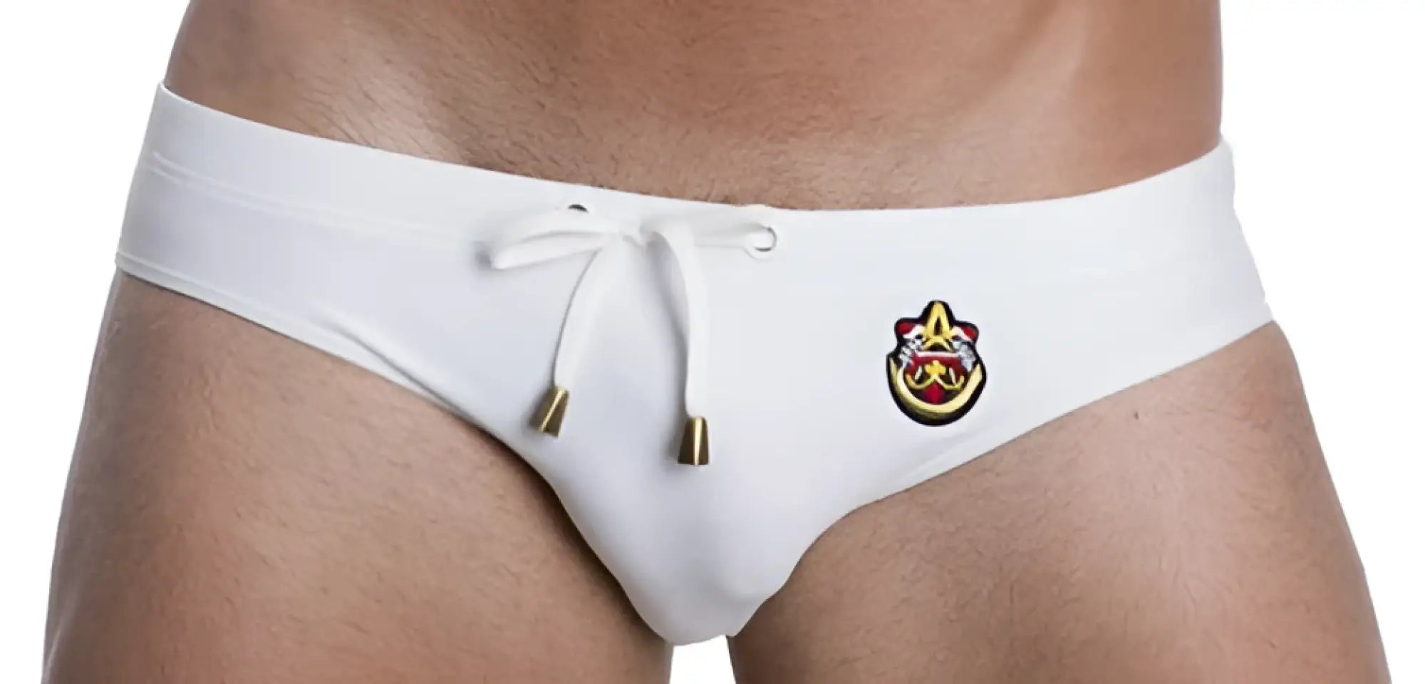 White men’s marcuse patrol bikini swimwear trunks with gold drawstring and front embroidered logo