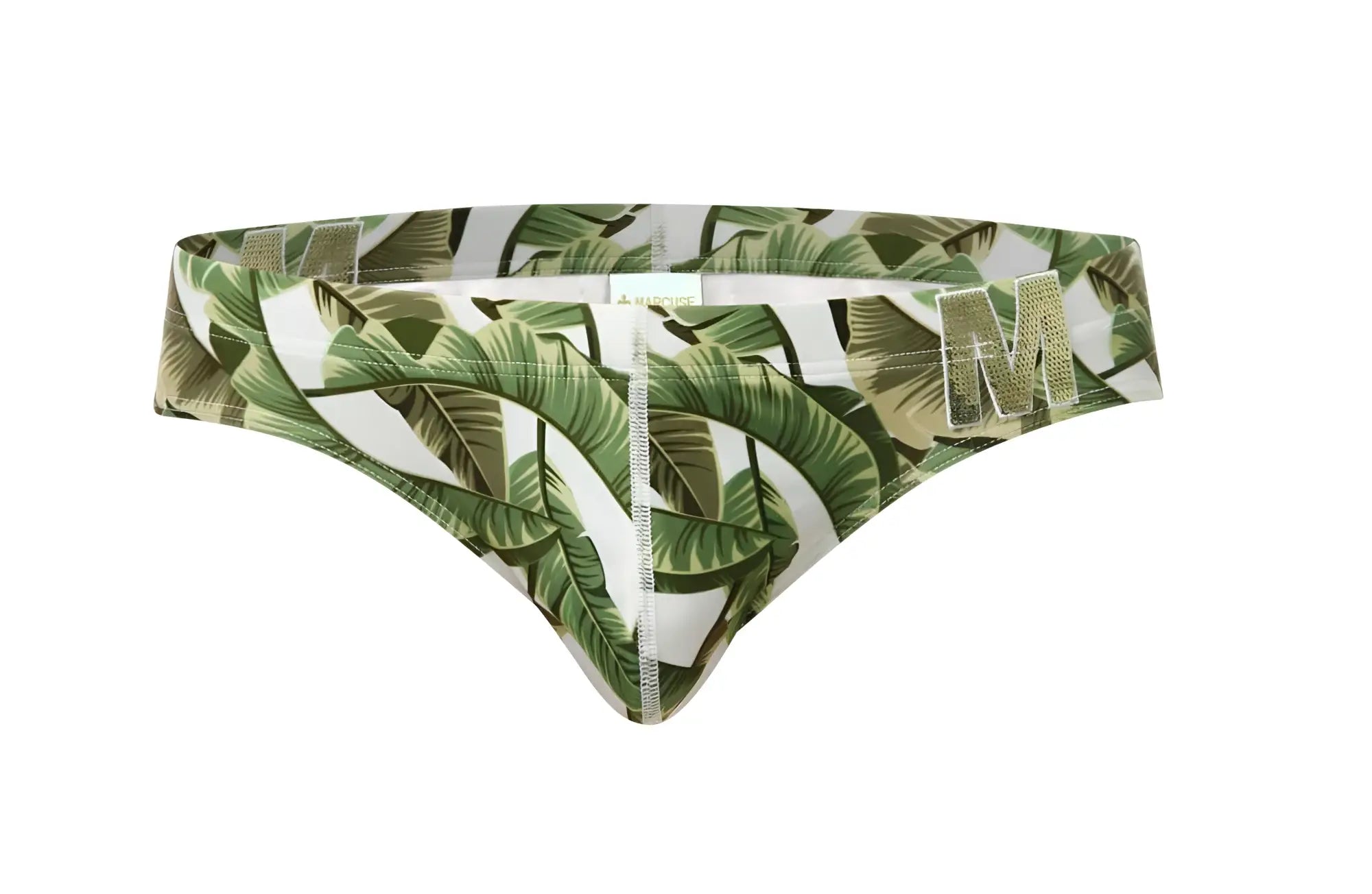Marcuse Phraya brief swimwear with green and white tropical leaf pattern and metallic gold m logo on the side