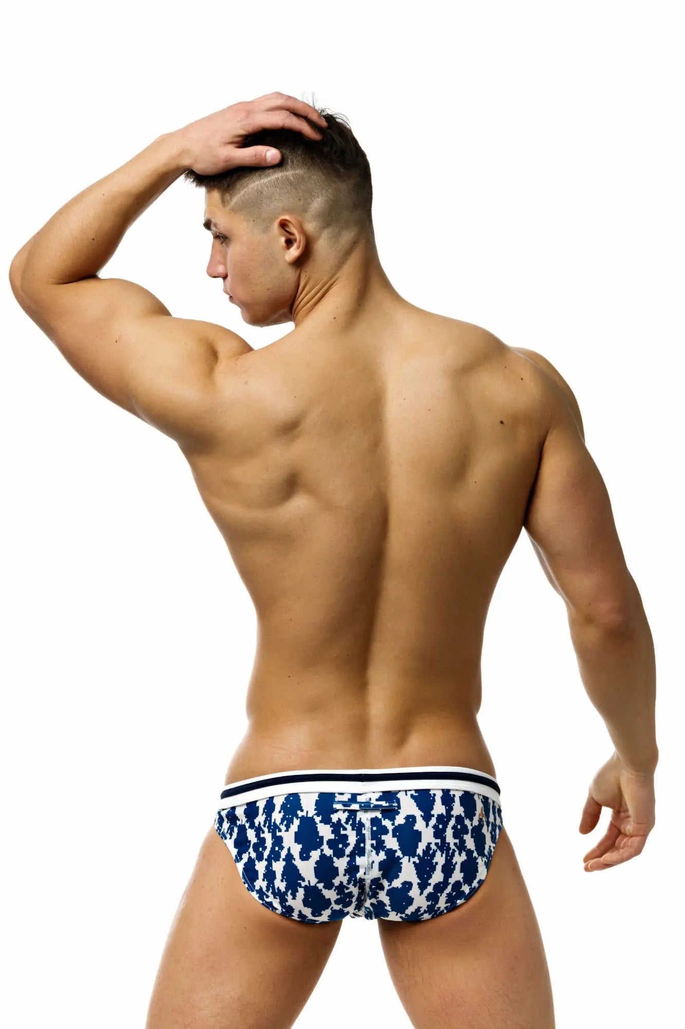 Marcuse phraya tanner bikini swimwear blue and white patterned men’s briefs with navy blue floral design