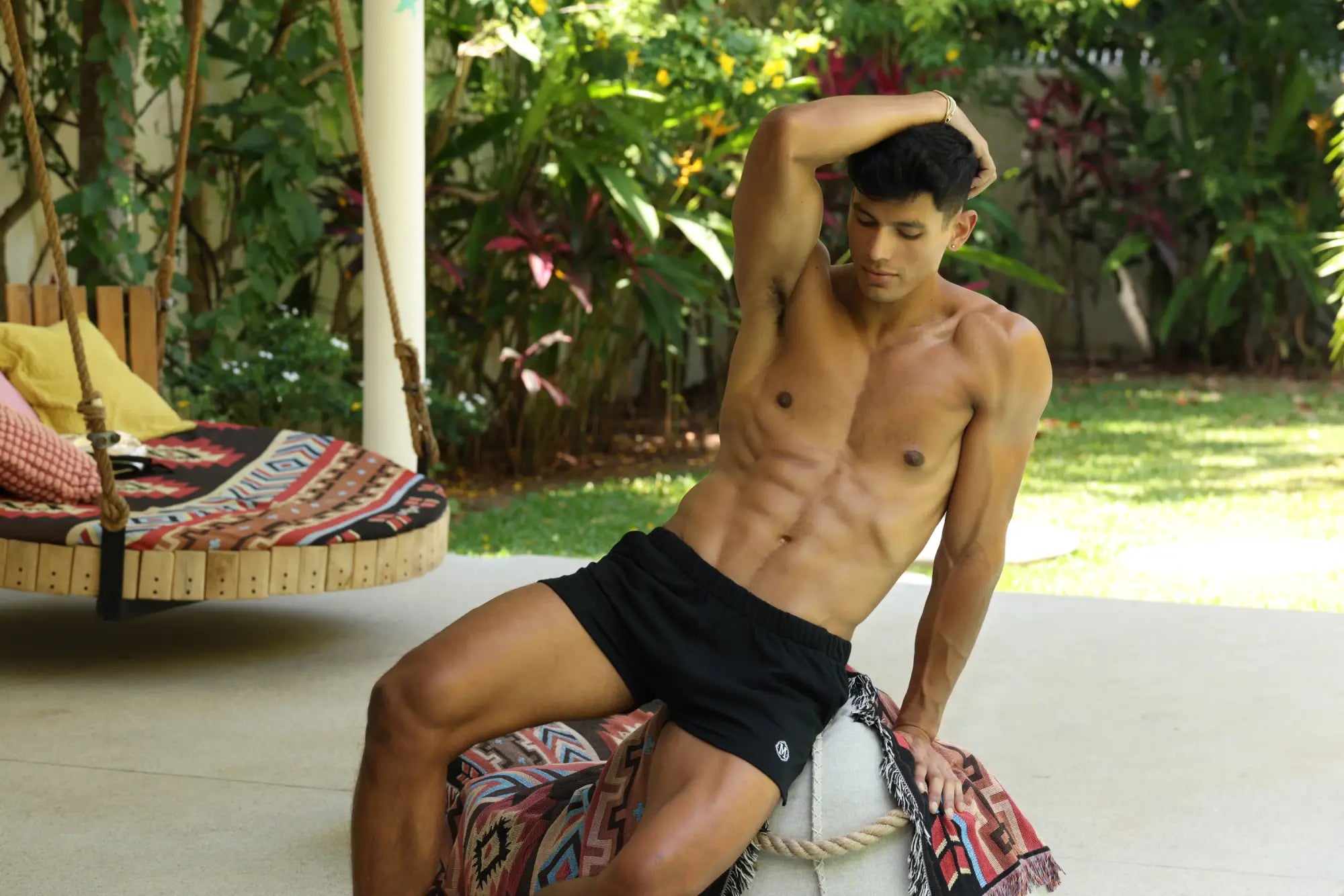 Black Marcuse physical athletic shorts with a small white logo on the left leg designed for active use