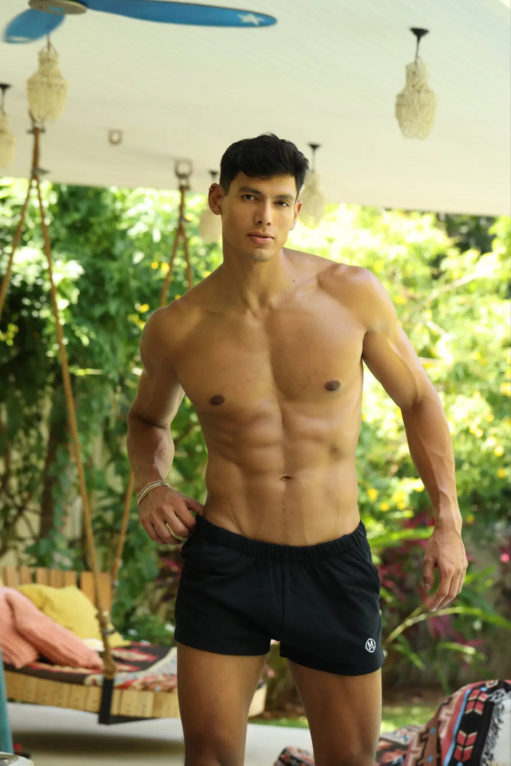 Marcuse physical shorts are black athletic shorts with a small white logo on the lower left leg for active wear