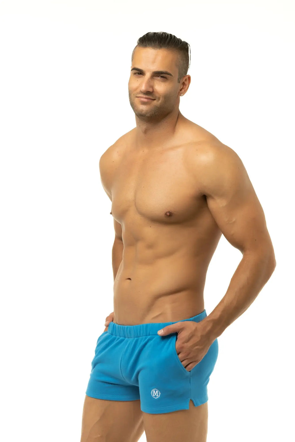 Marcuse physical shorts bright blue athletic shorts with a small white logo on the lower left leg designed for performance