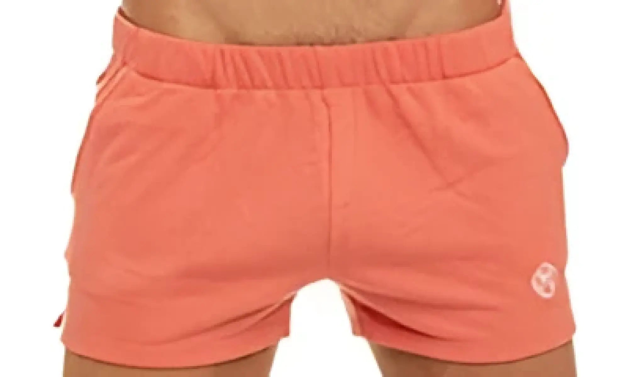Coral-colored marcuse physical shorts with stretchy elastic waistband and subtle side pockets for athletic use