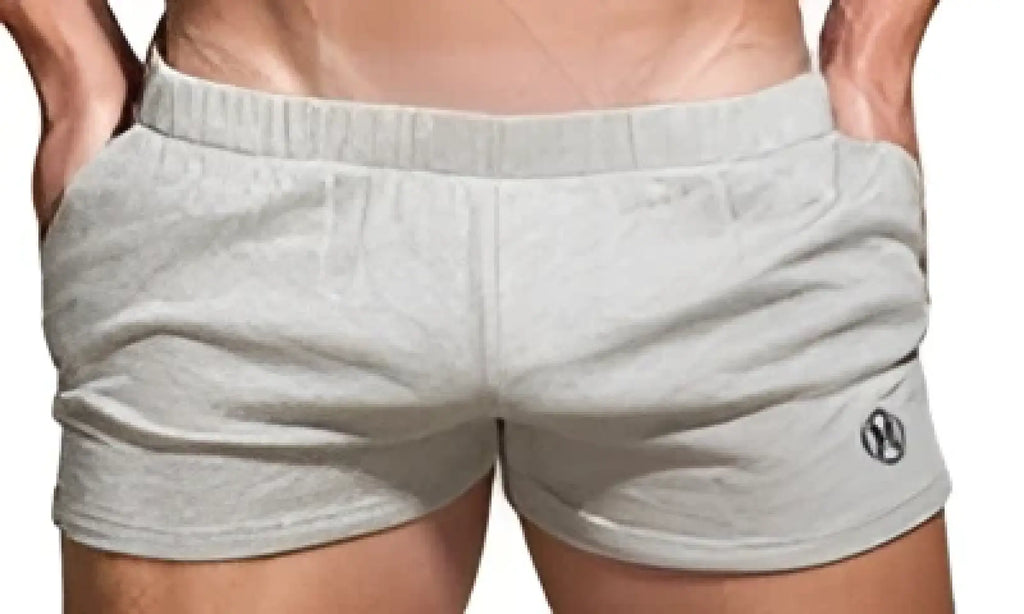Gray heathered marcuse physical shorts with a subtle brand logo on the left leg made from breathable fabric