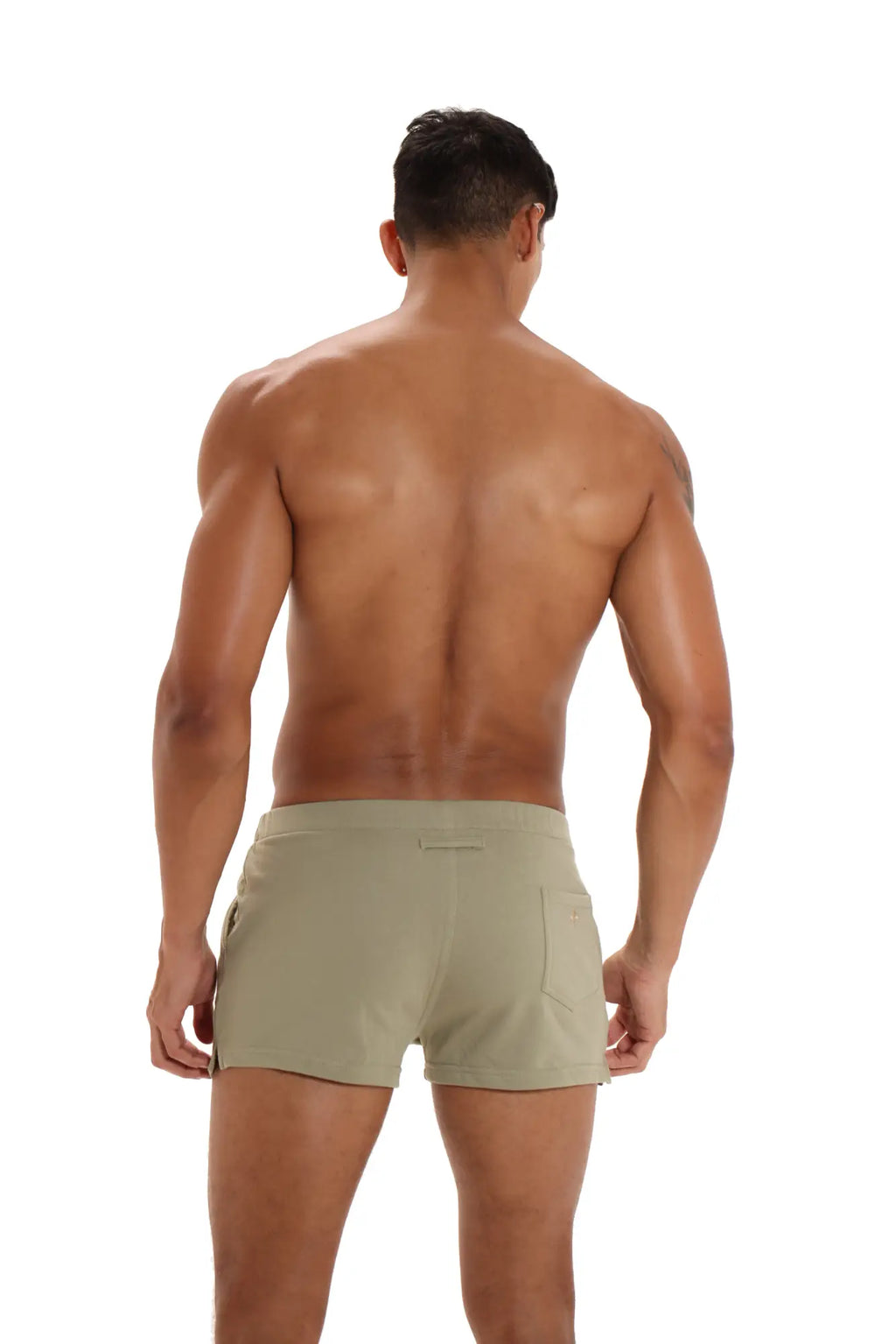 Marcuse physical shorts in khaki with a sleek modern design and subtle side pockets for athletic use