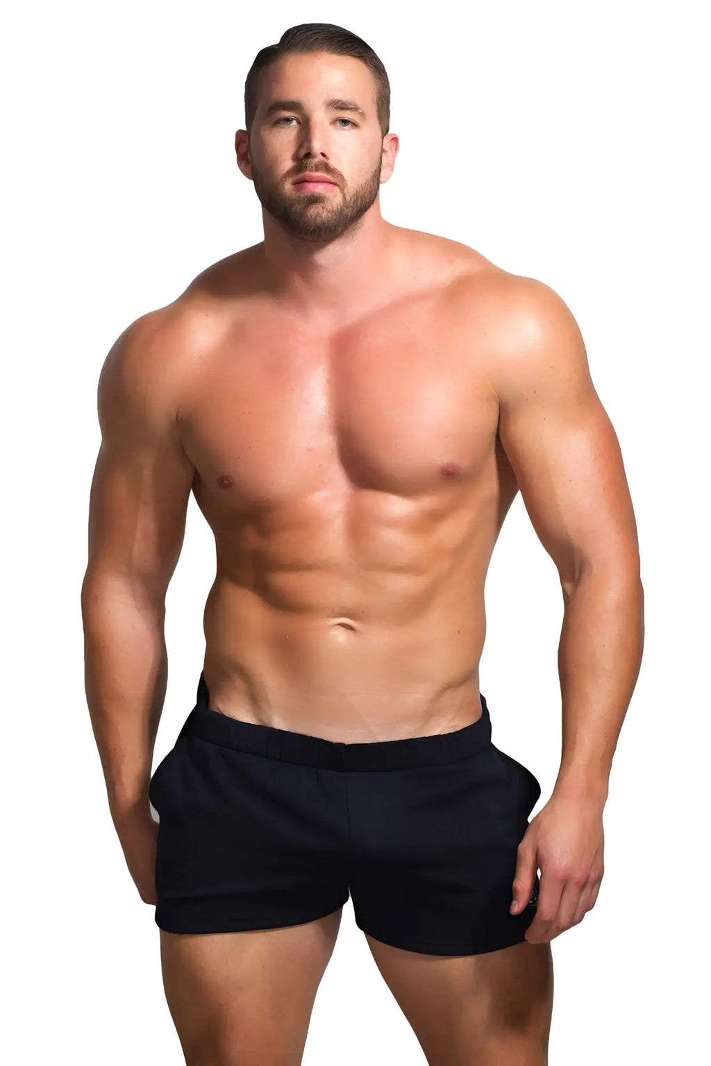 A man wearing black Marcuse physical shorts made of breathable fabric for athletic use shown from the back side