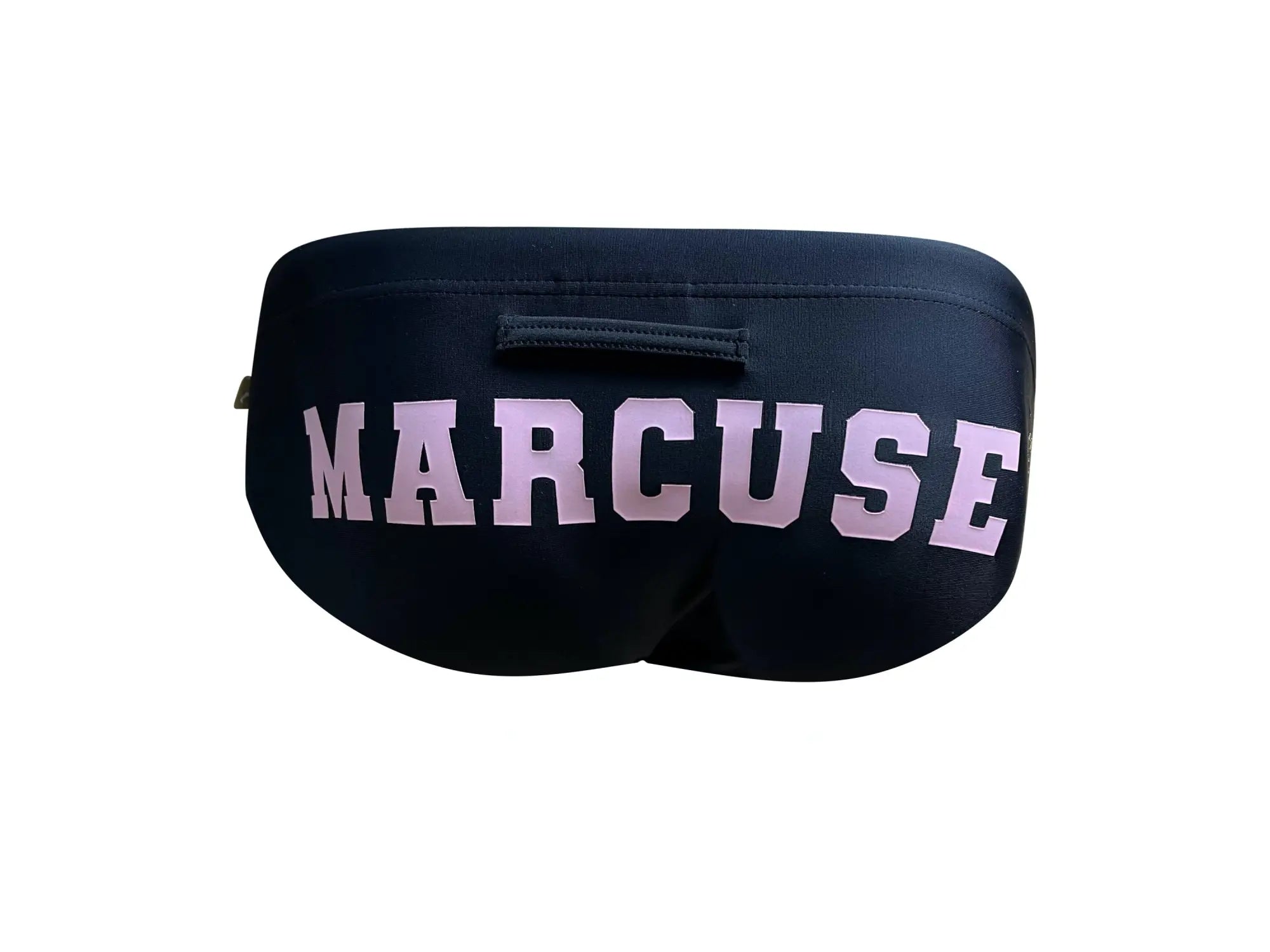 Black sleep mask with pink marcuse lettering featured in marcuse proud bikini swimwear collection