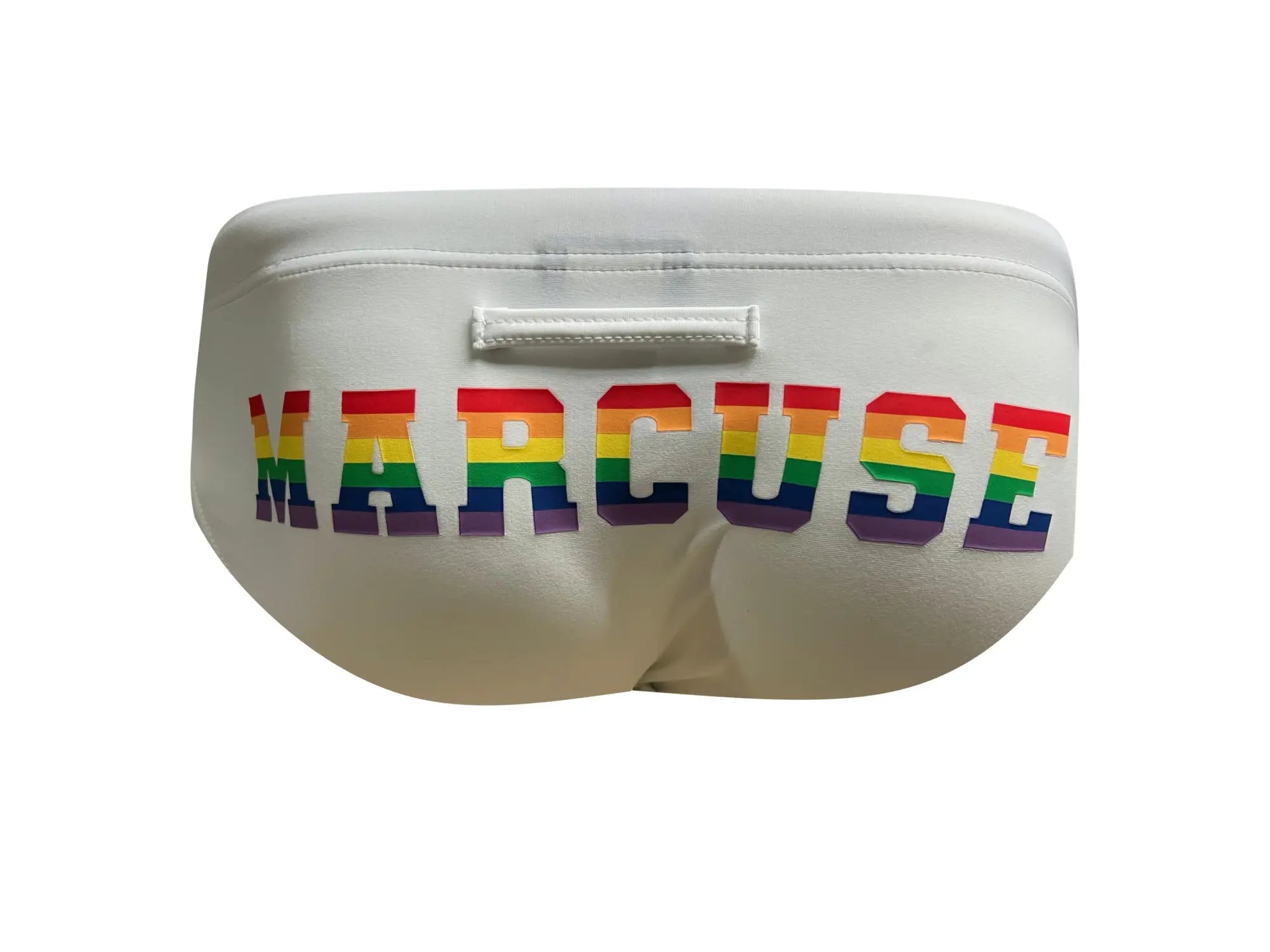 White marcuse briefs with bold rainbow lettering on the front designed as proud bikini swimwear