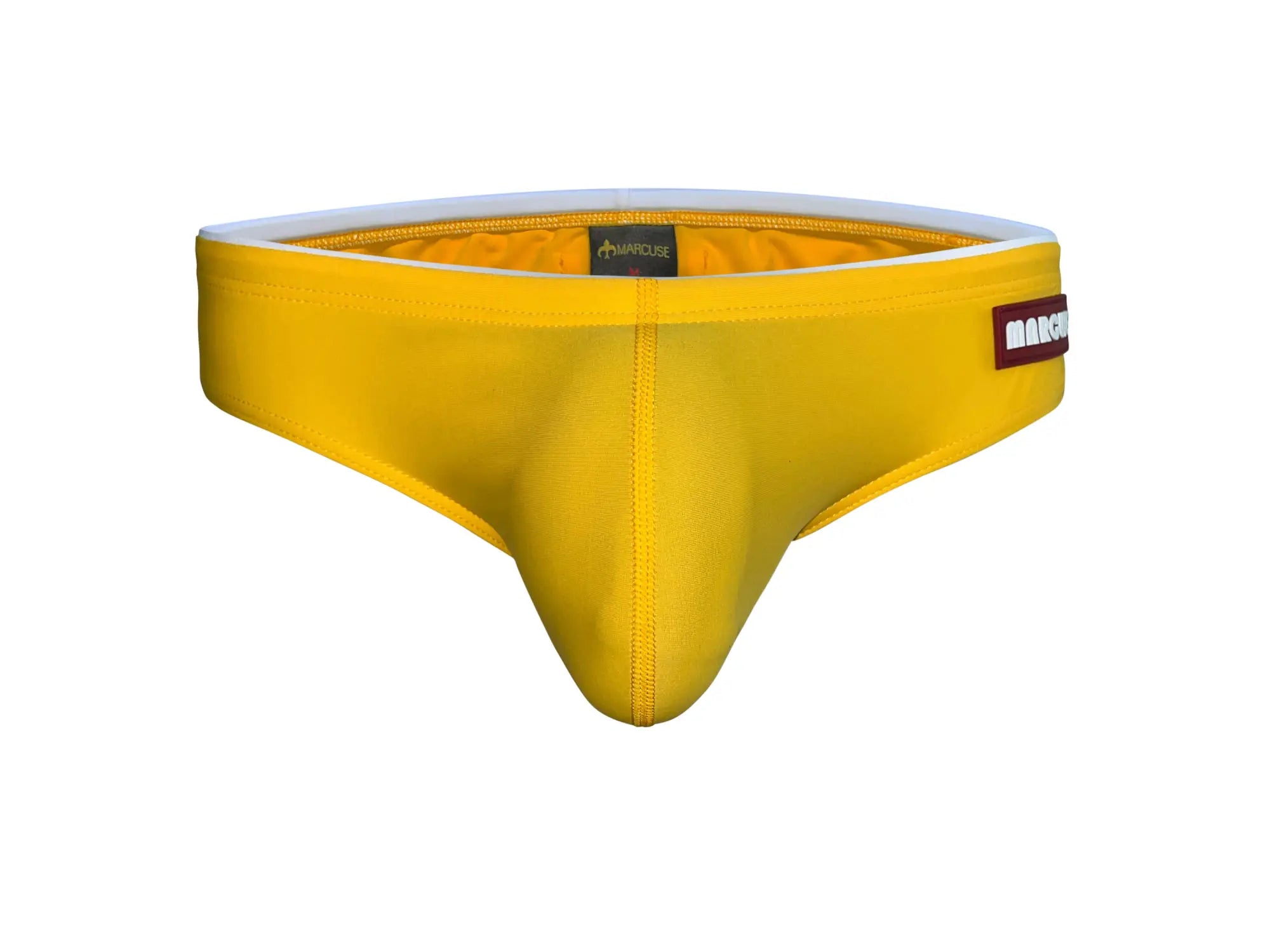 Marcuse Sandboy bikini swimwear bright yellow form-fitting men’s briefs with white elastic waistband and red brand label