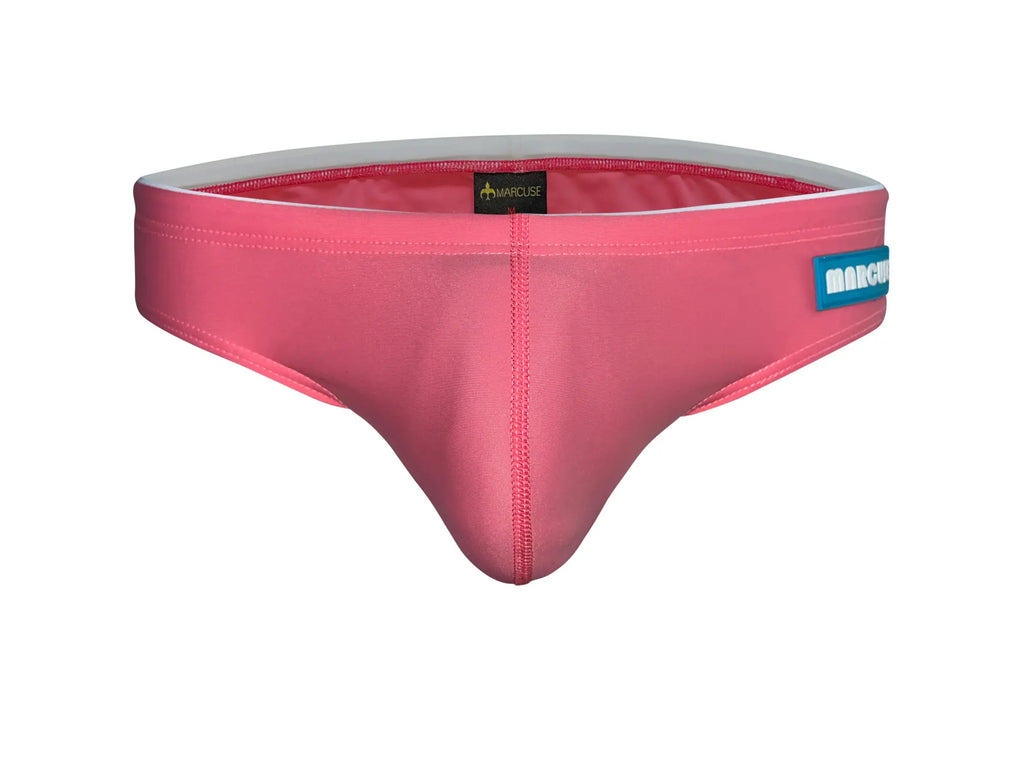 Pink marcuse sandboy bikini swimwear trunks with gray inner lining and blue brand tag for swimwear use