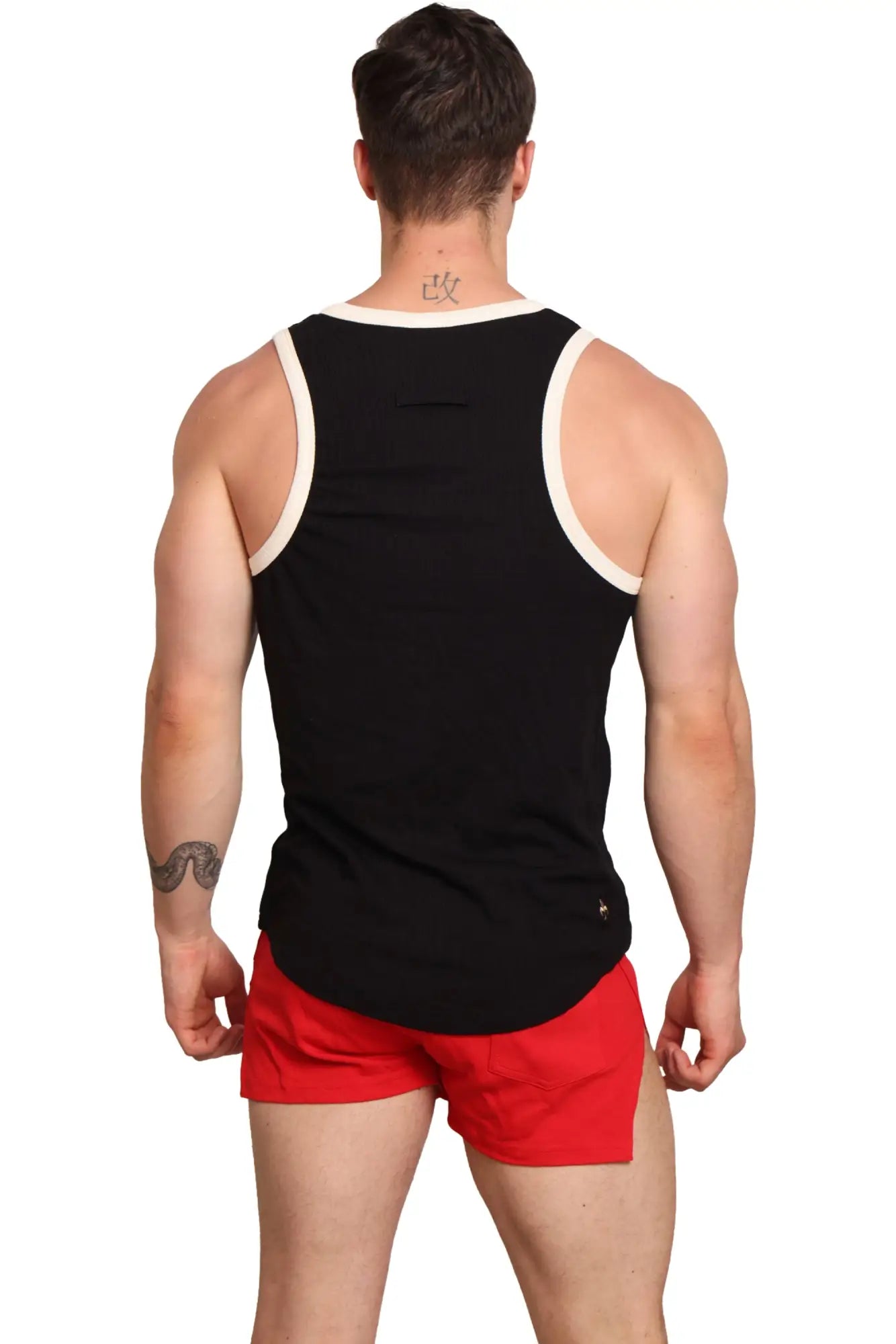 Black marcuse sexercise tank top with white trim around neckline and armholes for workout and casual wear