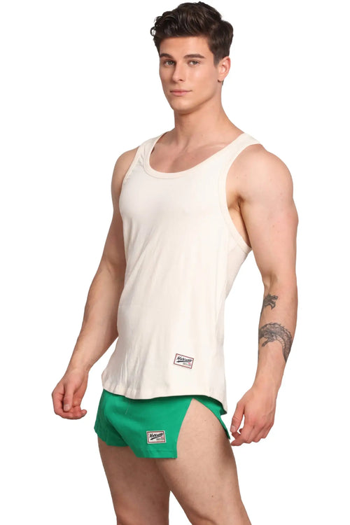 Cream-colored sleeveless Marcuse Sexercise tank top with small rectangular brand label on lower left side