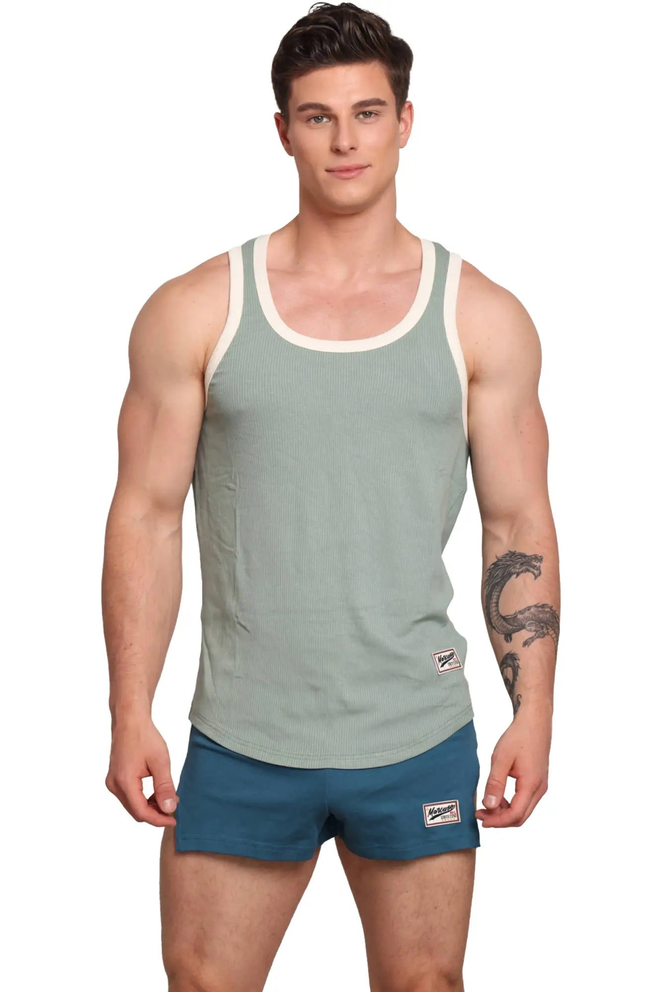 Marcuse Sexercise tank top men’s ribbed tank in muted sage green with cream trim around neckline and armholes