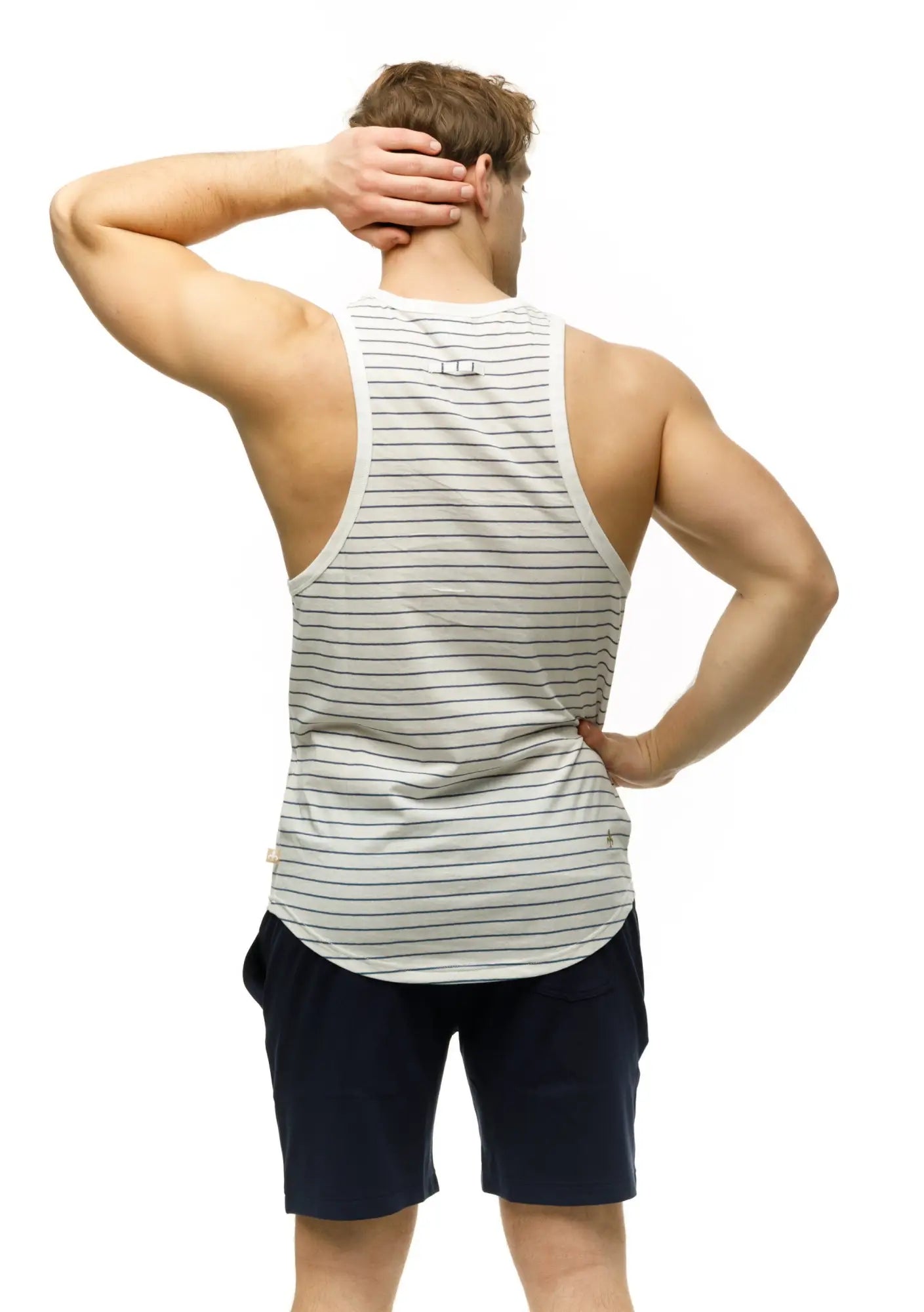 Back view of marcuse Somer tank top white with thin black stripes and a small logo on the back
