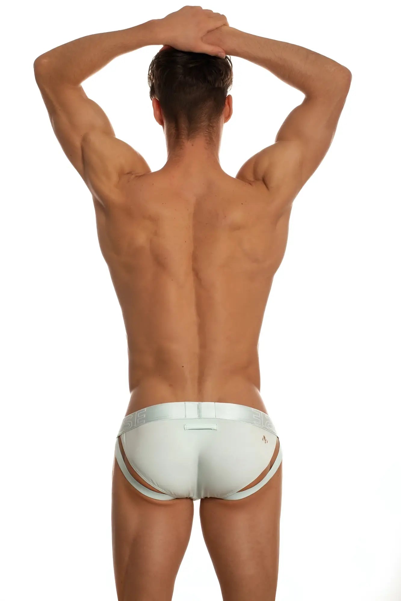 White marcuse spanky brief underwear with sleek contoured design and subtle side cutouts for athletic support