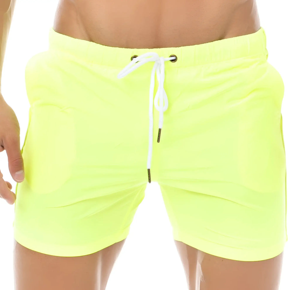 Marcuse Spectrum shorts bright neon yellow swim trunks with white drawstring and black aglets for swimming