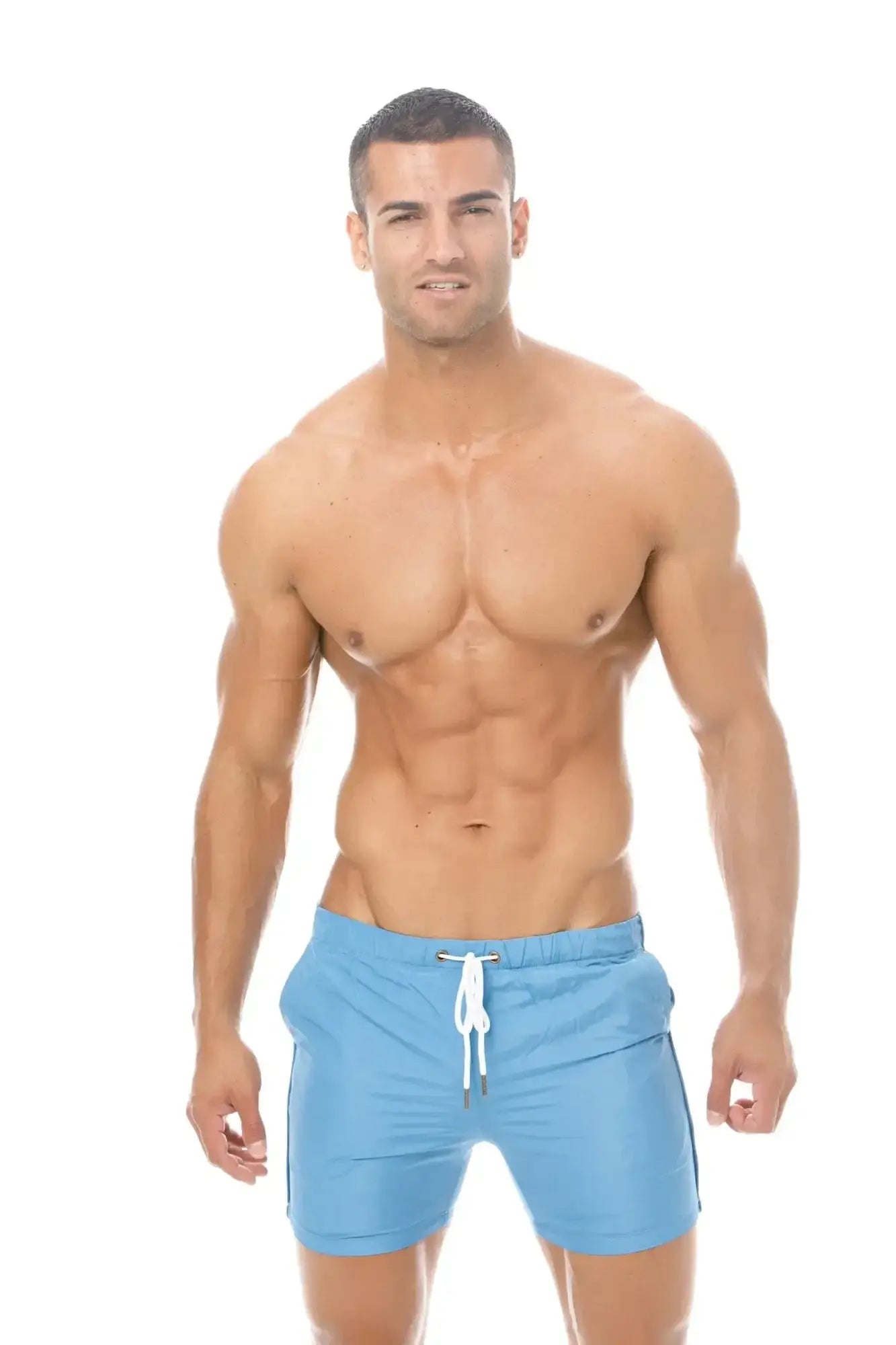 Light blue Marcuse Spectrum swim trunks with white drawstring designed for comfortable beachwear
