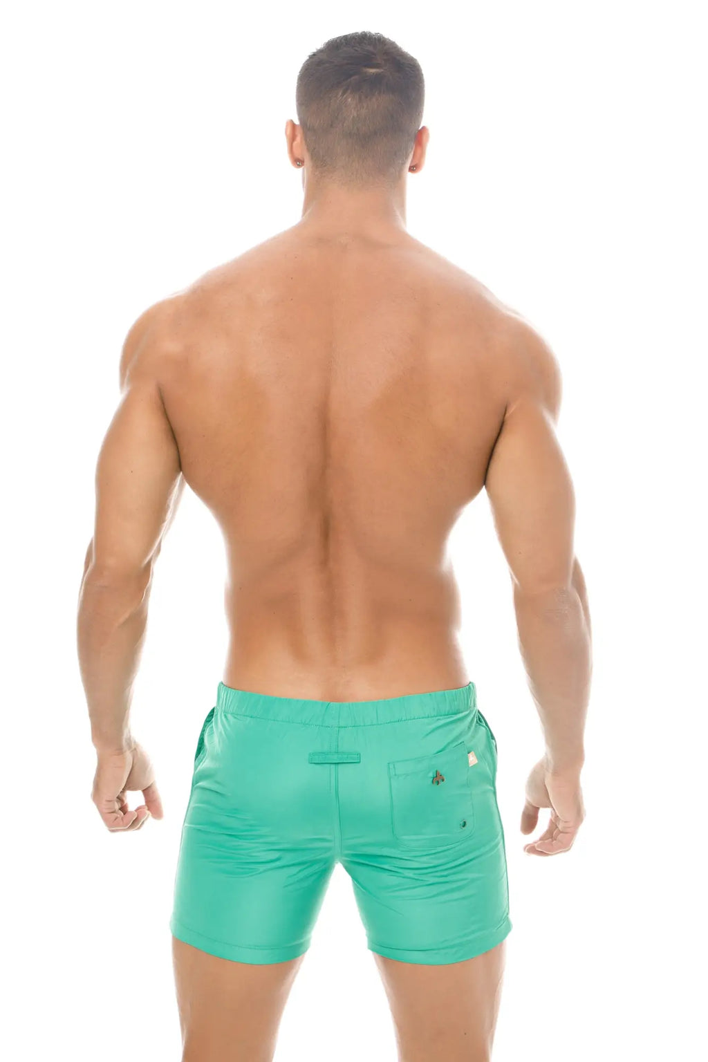 Teal marcuse spectrum athletic shorts made of lightweight fabric showing subtle logo on the back pocket