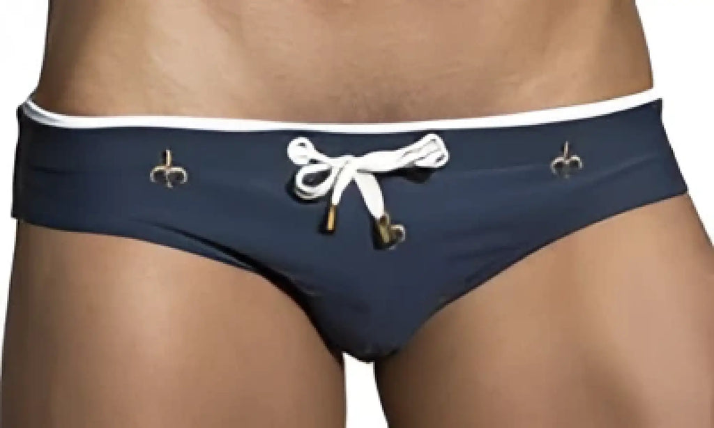 Navy blue Marcuse Starz bikini swimwear trunks with white trim and drawstring tie for comfortable swimming