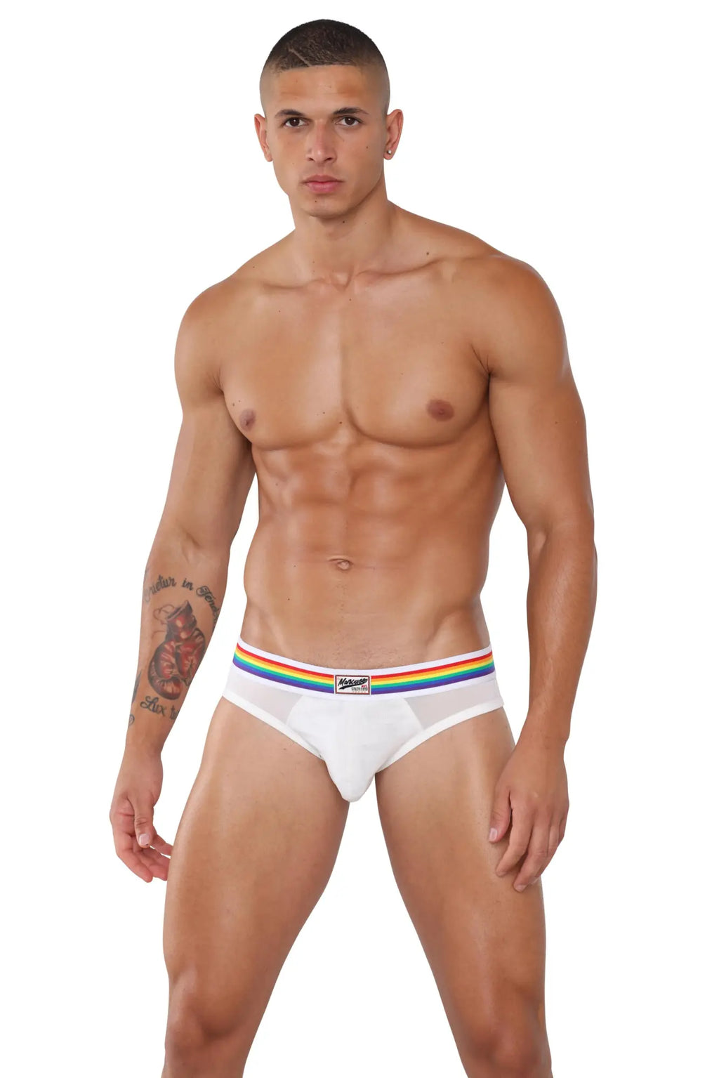 White marcuse sunray jock briefs with a rainbow-striped waistband and a small logo patch on the front