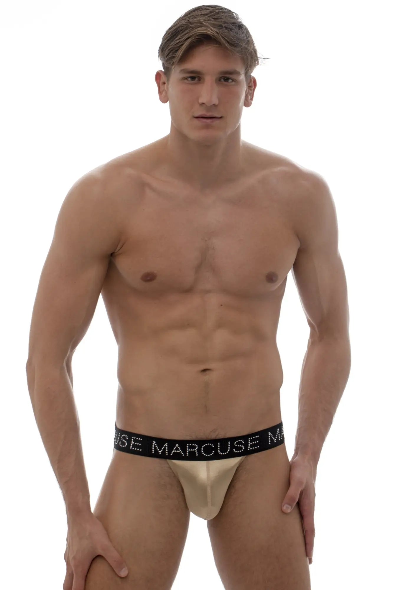Beige marcuse superstar brief underwear with black elastic waistband and white lettering for comfortable support