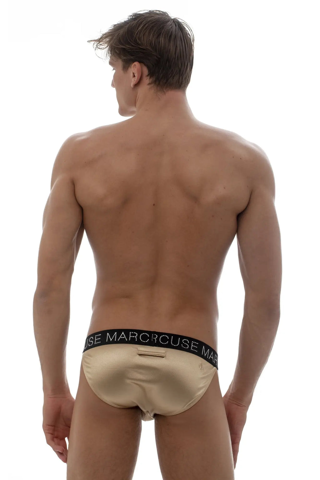 Beige satin marcuse superstar brief underwear with black elastic waistband featuring marcuse brand name in white lettering