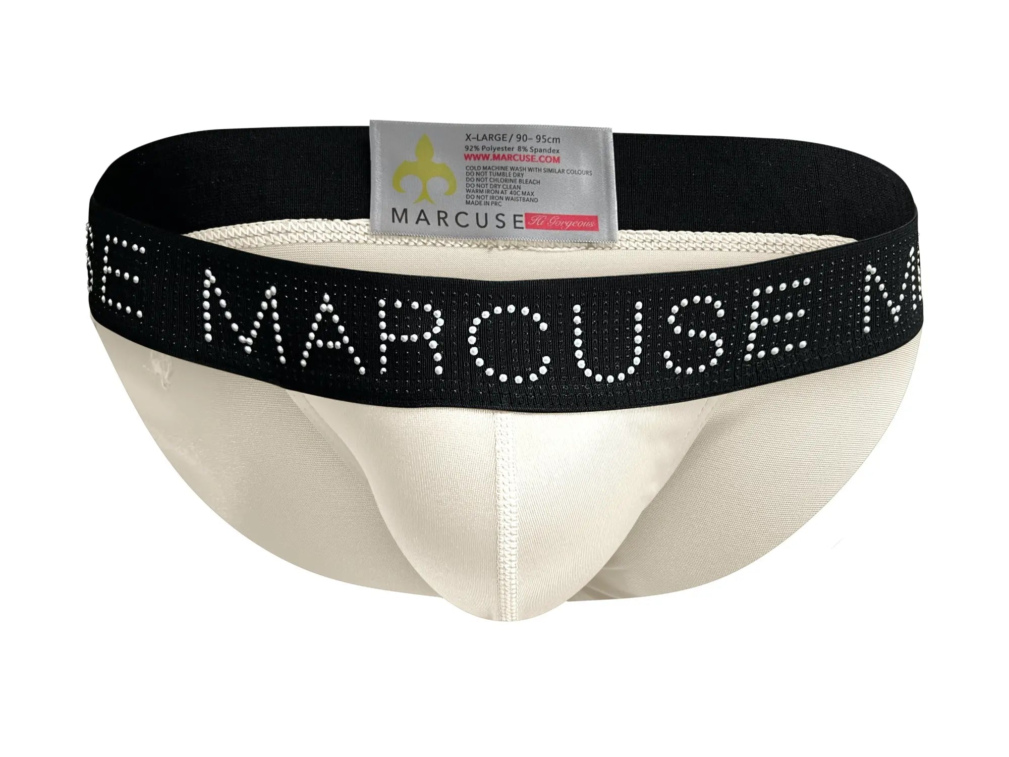 Cream-colored marcuse superstar brief underwear with black elastic waistband and white rhinestone marcuse logo