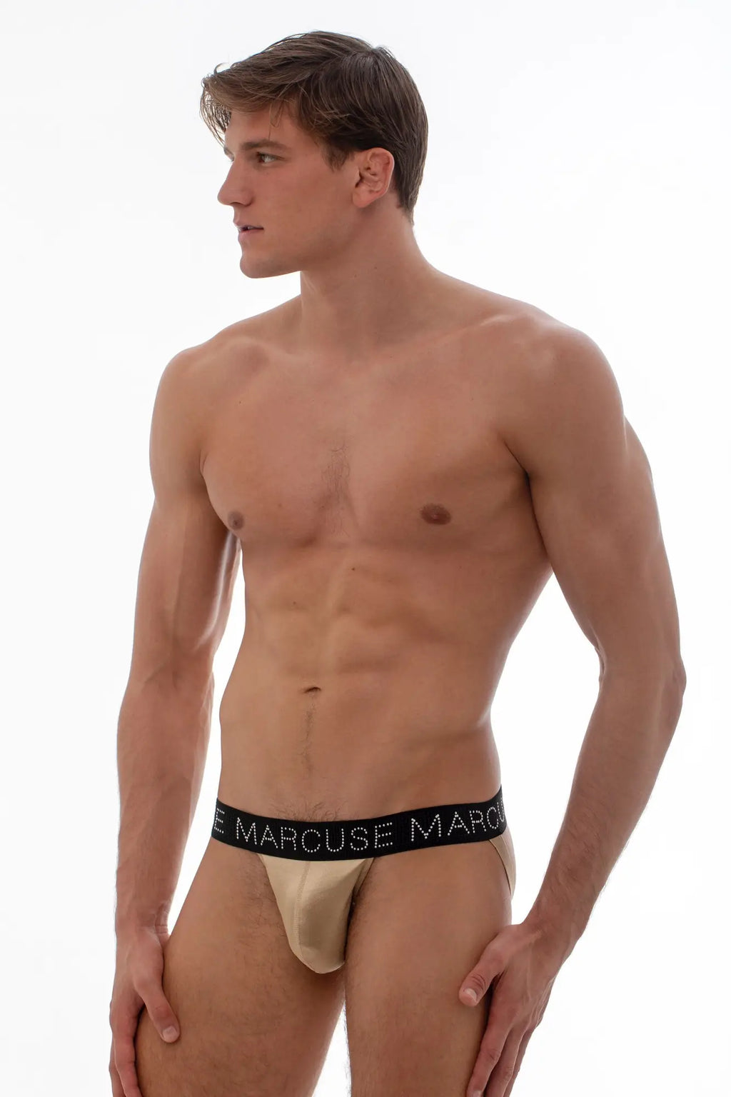 Beige Marcuse Superstar jock briefs with black elastic waistband and white logo lettering for activewear use