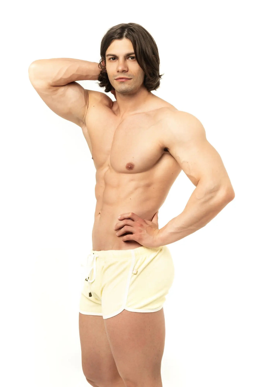 Marcuse sweat shorts in light yellow with white side panels and a drawstring waistband for athletic use