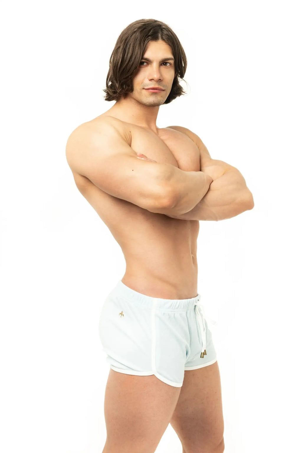 White Marcuse sweat shorts with drawstring waistband and embroidered logos on side pockets for athletic wear