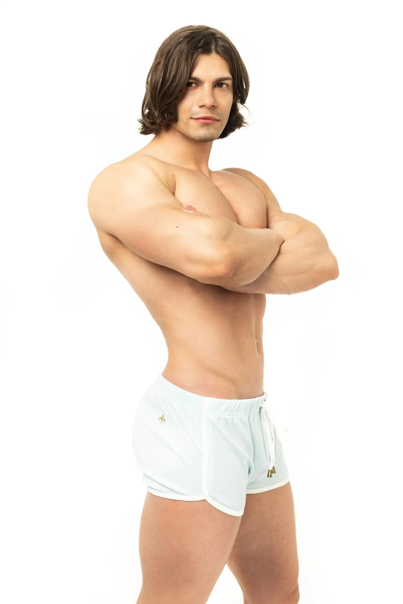 White Marcuse sweat shorts with drawstring waistband and embroidered logos on side pockets for athletic wear