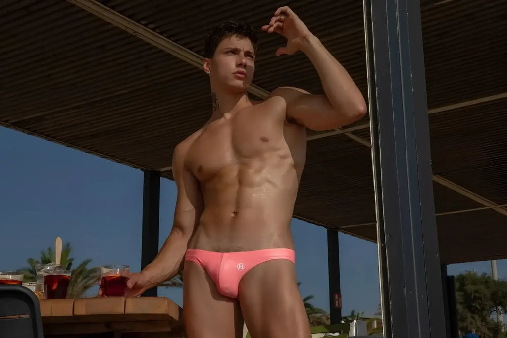 Pink marcuse syd23 bikini swimwear trunks with a small front logo designed for swimming and beach use