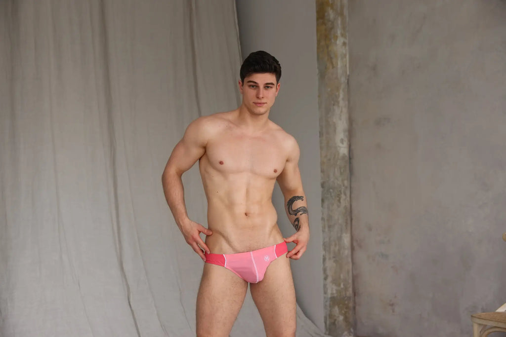 Marcuse Tropez bikini swimwear pink athletic briefs with subtle white logo on left hipband for swim use