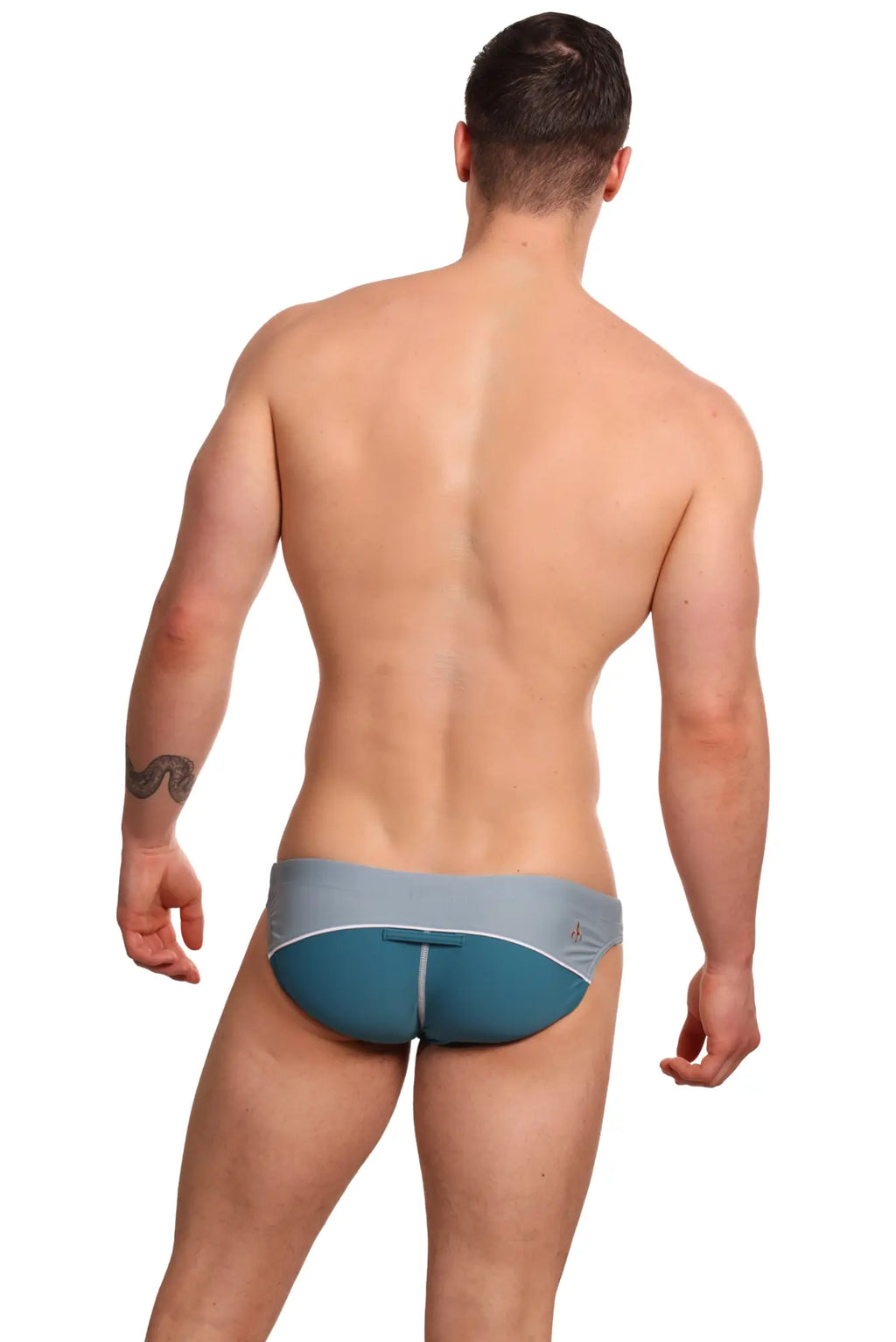 Marcuse Tropez bikini swimwear men’s brief with a sleek two-tone gray upper and teal lower panel