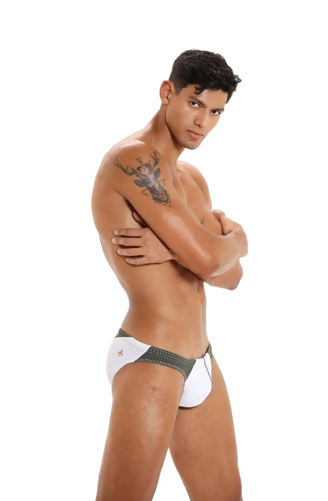 White and dark green marcuse umbra bikini swimwear with perforated side design in athletic briefs style
