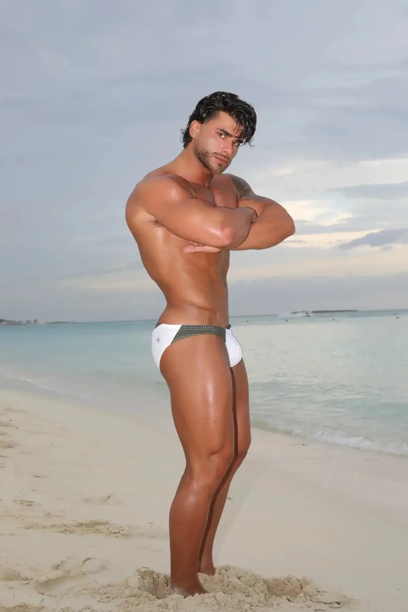 White marcuse umbra bikini swimwear swim trunks with dark patterned waistband for beach and pool use