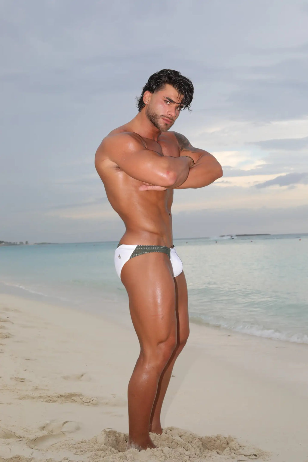 White marcuse umbra bikini swimwear swim trunks with dark patterned waistband for beach and pool use