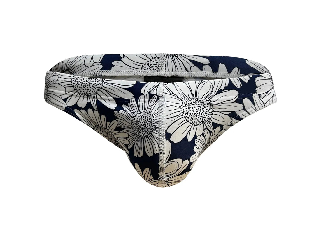 Marcuse Utopia bikini swimwear navy blue swim trunks with white daisy pattern perfect for beachwear