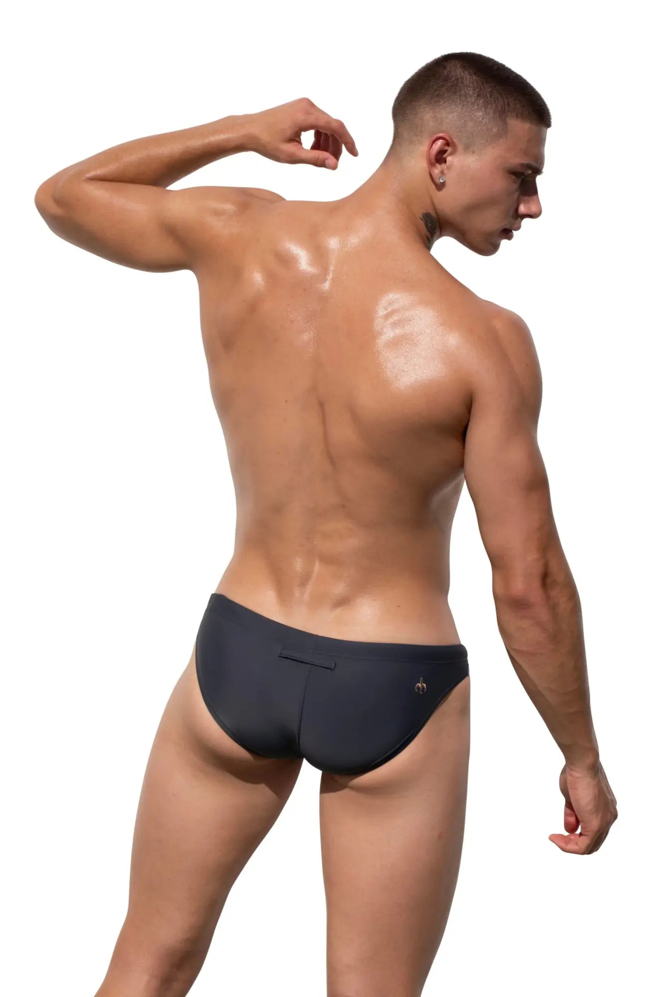 Black Marcuse Vacay bikini swimwear trunks with a subtle logo on the waistband designed for swimming and beachwear