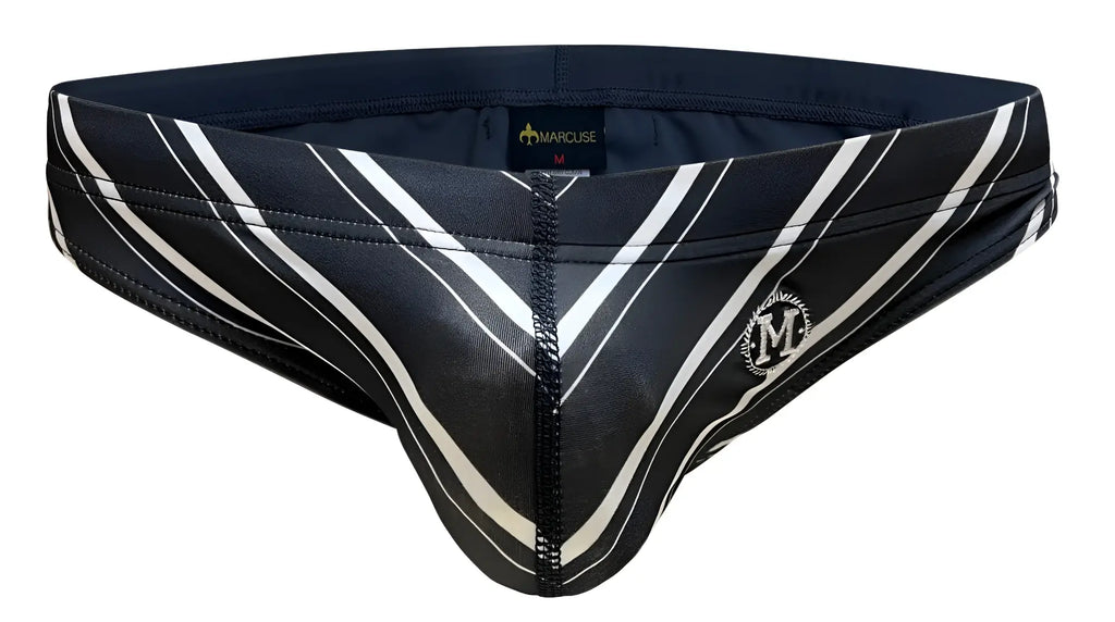Black and white striped marcuse vacay bikini swimwear men’s swim trunks with bold diagonal stripes and branded logo on side